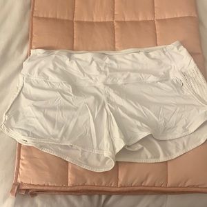 White Lululemon Shorts with Crochet Sides